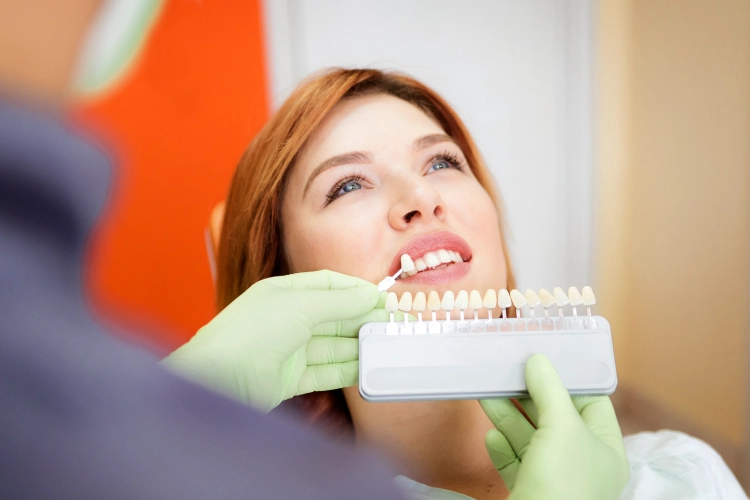 • Dentist applying porcelain veneers at Heavenly Dental Surrey